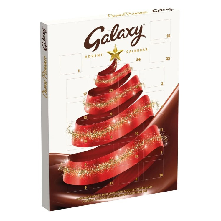 A Galaxy Advent Calendar chocolate box by Dark Matter Collections, featuring a white front with a red spiral chocolate tree, gold star, and brown chocolate swirls.