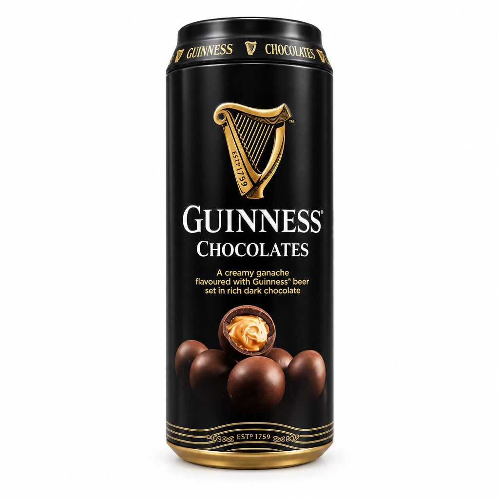 A single can of Guinness Chocolates chocolate bar standing upright on a textured beige surface with a blurred background.