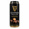 A single can of Guinness Chocolates chocolate bar standing upright on a textured beige surface with a blurred background.