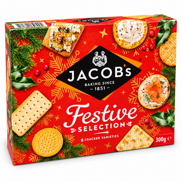 A 300g box of Jacobs Baking Since 1851 'Festive Selection' cracker varieties, featuring a festive red box decorated with illustrations of holiday crackers, holly, pine branches, and red berries.