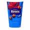 A 240g bag of Cadbury Roses chocolates standing on a stone countertop with a blurred kitchen background.