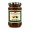 A glass jar of Thursday Cottage Handmade Mincemeat on a white background. The jar contains dark brown mince meat and has a cream-colored label with a red bow and green holly border, topped with a black and white checkered lid.