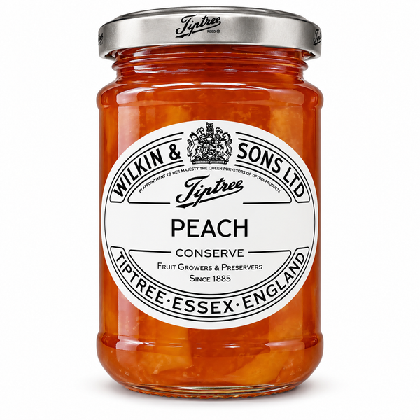 A glass jar of Wilkin & Sons Ltd Tiptree Peach Conserve with a silver metal lid and a white oval label, shown on a clean white background.