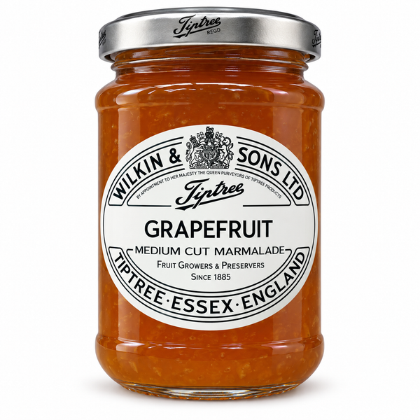 A glass jar of Wilkin & Sons Ltd. Tiptree Grapefruit Marmalade with a silver metal lid and a white label, set against a plain white background.