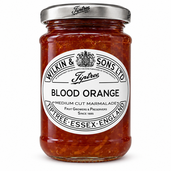 A glass jar of Wilkin & Sons Ltd Jiptree Blood Orange marmalade, showing the orange-red fruit pieces inside, with a white and black label and a silver metal lid, set against a plain white background.