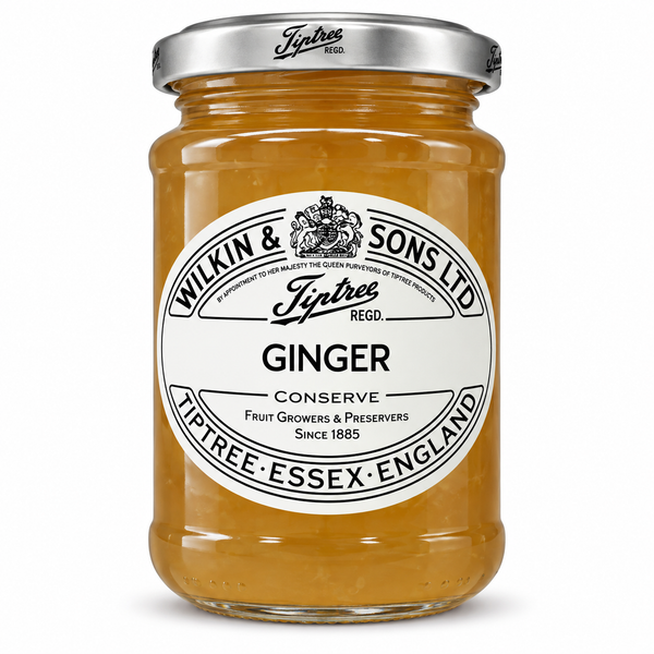 A jar of Wilkin & Sons Ltd Tiftree Ginger Conserve, showing the amber-colored ginger preserve through a clear glass jar with a white label and a silver metal lid.